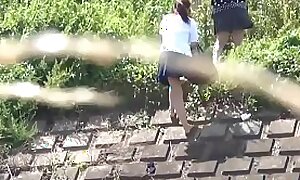 Japanese students urinating outdoors