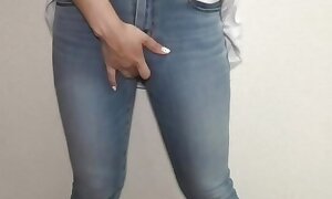 Cute unreserved in grasping jeans stains her jeans with masturbation juice.