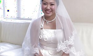 Japanese girl in a wedding garments Emi Koizumi takes a hard weasel words in her mouth uncensored.