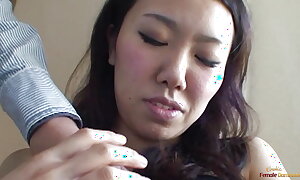 Pierced Asian skirt gets her hairy cookie fingered and fucked